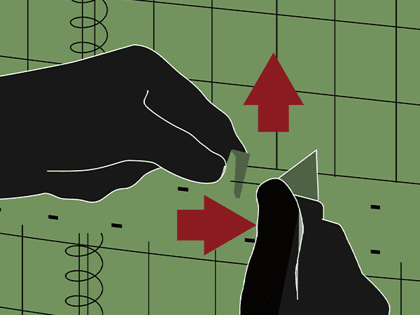 A worker is cutting the geotextile with knife.