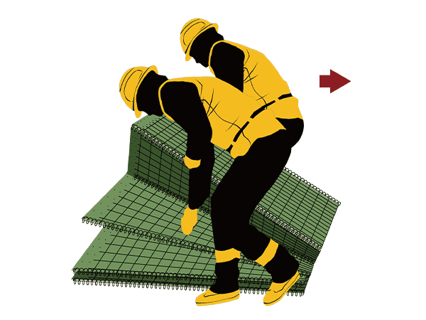 Two workers are stretching one unit of defensive barrier.