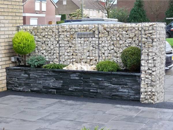 A gabion fence are installed in the yard.