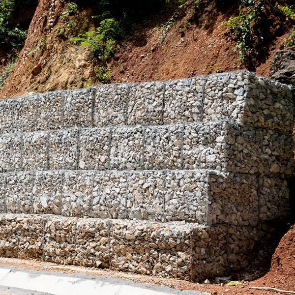 galvanized gabions are installed at the foot of mountain.